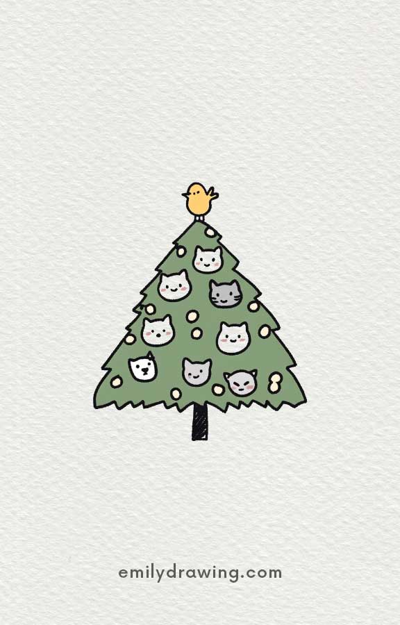 Christmas tree decorated with cute cat faces and a bird topper.