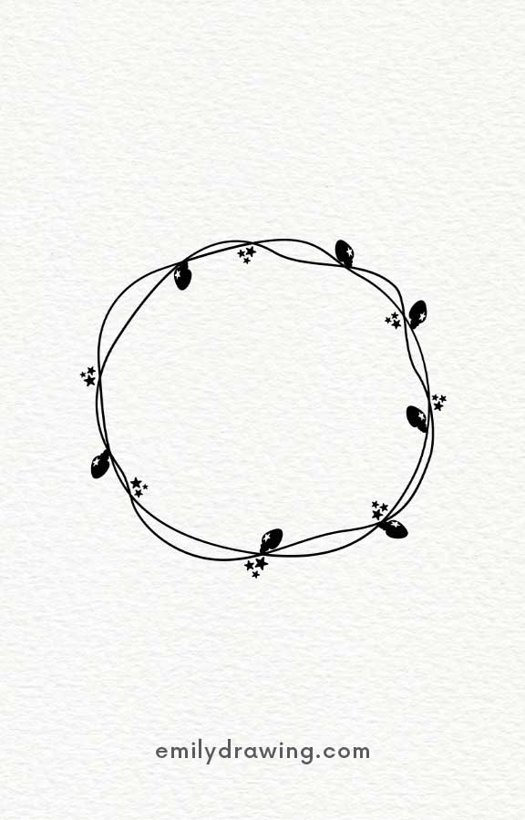 Minimalist circular wreath with leaves and small flowers.