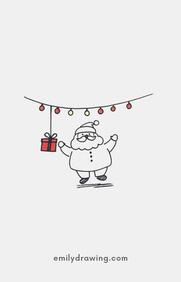 Santa standing under string lights with a dangling gift box.